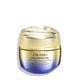A round, gold-and-purple-colored jar of Shiseido Vital Perfection Uplifting and Firming Advanced Cream. The closed jar features the Shiseido logo, product name, and the words "ReNeuraRED Technology." 
